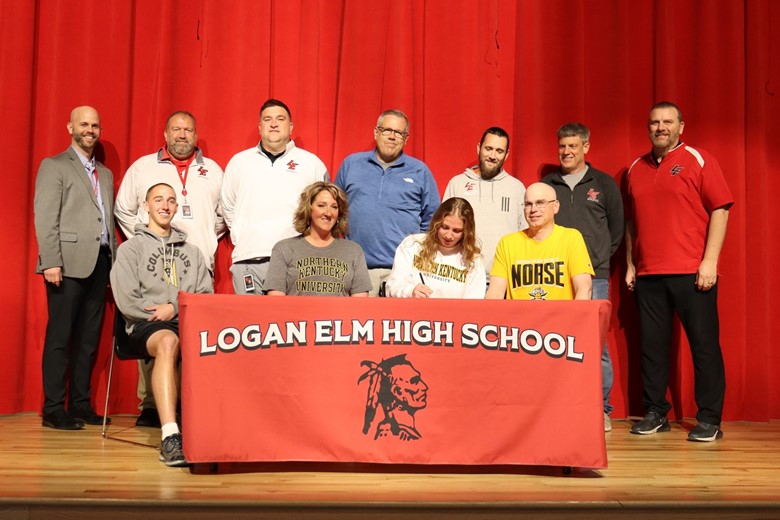 Maggie signing